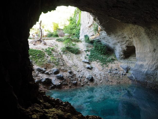 looking out of a deep cave