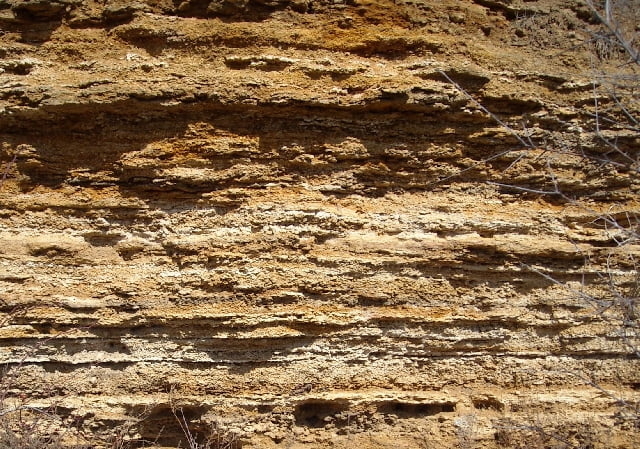 cross section of bedrock and earth
